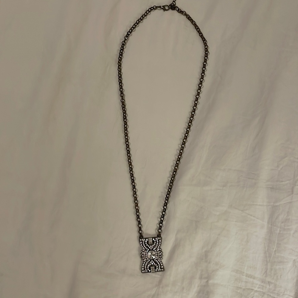 Vintage style plunder pendant necklace.